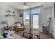Comfortable living room showcasing a door to the outside and natural light at 11440 E Martin Luther King Jr Blvd, Denver, CO 80238