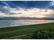 Stunning aerial view of a serene lake with mountains in the background, perfect for nature lovers and outdoor enthusiasts at 9346 Flower St, Broomfield, CO 80021