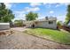 Spacious backyard featuring a patio, fire pit area, and mature trees at 9346 Flower St, Broomfield, CO 80021