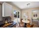 Cozy breakfast nook with stylish table, chairs, and sliding glass door to the backyard at 9346 Flower St, Broomfield, CO 80021