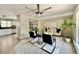 Bright and airy living room featuring modern furnishings, stylish decor, and an open floor plan at 9346 Flower St, Broomfield, CO 80021