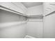 Spacious walk-in closet featuring ample shelving and rod space at 9346 Flower St, Broomfield, CO 80021