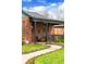 Inviting front porch with seating, creating a welcoming entrance at 2120 N Poplar St, Denver, CO 80207