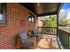 Relaxing front porch with comfortable seating and a cozy atmosphere at 2120 N Poplar St, Denver, CO 80207