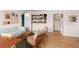 Bright living room with hardwood floors and comfortable seating at 2120 N Poplar St, Denver, CO 80207