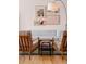 Cozy living room featuring modern art, comfortable seating, and a stylish lamp at 2120 N Poplar St, Denver, CO 80207