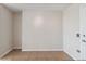 An empty room with tile floors, ready for customization and offering versatility in design at 909 N Logan St # 6J, Denver, CO 80203