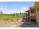 Large backyard features beautiful mountain views and outdoor living spaces at 1988 Lake Dr, Larkspur, CO 80118