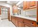 Bathroom boasts custom cabinetry, solid surface countertops, and access to the closet at 1988 Lake Dr, Larkspur, CO 80118
