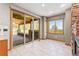 Bright living area with large windows providing lots of natural light and mountain views at 1988 Lake Dr, Larkspur, CO 80118
