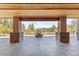 Covered patio featuring recessed lighting, wood ceiling, and decorative sphere fire pit at 1988 Lake Dr, Larkspur, CO 80118
