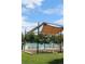 Outdoor community pool with ample seating and shade structures at 2708 Syracuse St # 109, Denver, CO 80238