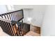 View of staircase leading to the upper level with doors to other rooms at 9182 Weeping Willow Ct, Highlands Ranch, CO 80130