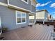 View of the back deck shows a beautiful entertaining area with planters and a nice view of the surrounding homes at 12164 Poplar St, Thornton, CO 80602