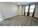 This cozy bedroom features plush carpeting, natural light, and is ready for its new occupants at 12164 Poplar St, Thornton, CO 80602