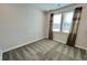 Bright bedroom with carpet, windows, and stylish curtains at 12164 Poplar St, Thornton, CO 80602