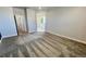 Spacious main bedroom with carpet and ensuite bathroom at 12164 Poplar St, Thornton, CO 80602