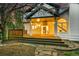 Charming backyard deck and patio with lovely landscaping features at 44 Spyglass Dr, Littleton, CO 80123