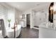 Elegant bathroom with soaking tub, walk-in shower, and hexagon tile floors at 44 Spyglass Dr, Littleton, CO 80123