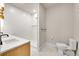 Bathroom with double vanity, toilet and shower at 44 Spyglass Dr, Littleton, CO 80123