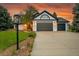 Charming home with a three-car garage and an inviting driveway at 44 Spyglass Dr, Littleton, CO 80123