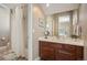 Cozy bathroom with a shower and tub combo and a vanity with a sink at 350 Andromeda Ln, Castle Rock, CO 80108