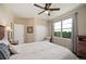 Bedroom with neutral walls and large window with lovely outdoor views at 350 Andromeda Ln, Castle Rock, CO 80108