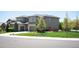 Elegant home with a three-car garage, landscaped front yard, and beautiful curb appeal at 350 Andromeda Ln, Castle Rock, CO 80108