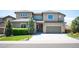 Charming home with a well-manicured lawn, two car garage and inviting front entrance at 350 Andromeda Ln, Castle Rock, CO 80108