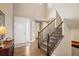 Grand foyer with hardwood floors, a staircase, and a bright, welcoming entryway at 350 Andromeda Ln, Castle Rock, CO 80108