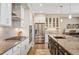 Contemporary kitchen with stainless steel appliances, granite counters, and hardwood flooring at 350 Andromeda Ln, Castle Rock, CO 80108
