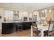 Modern kitchen featuring granite countertops, stainless steel appliances, and a center island at 350 Andromeda Ln, Castle Rock, CO 80108