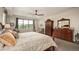 Serene main bedroom with a large window, comfortable seating, and elegant furniture at 350 Andromeda Ln, Castle Rock, CO 80108