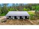 Aerial view of barn with multiple stalls, sturdy construction, and functional design at 8537 S Doubleheader Hwy, Morrison, CO 80465