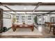 Open dining area with great natural light and dark wood beam details at 8537 S Doubleheader Hwy, Morrison, CO 80465