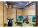Close-up of a goat pen in the barn featuring a group of farm animals eating hay at 8537 S Doubleheader Hwy, Morrison, CO 80465