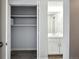 Bathroom with white vanity and linen closet at 3047 W 47Th Ave # 506, Denver, CO 80211