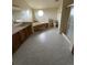 Large bathroom with corner tub, double sinks, and a standing shower at 554 E Pleasant Ave, Byers, CO 80103