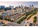 Aerial view of Denver's city skyline and riverfront homes at 1440 Little Raven St # 204, Denver, CO 80202