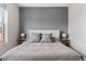 Primary bedroom with neutral decor and plush bedding at 1440 Little Raven St # 204, Denver, CO 80202