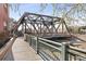 Walkway alongside a creek with a bridge at 1440 Little Raven St # 204, Denver, CO 80202