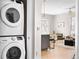 Stackable washer and dryer in laundry closet at 1440 Little Raven St # 204, Denver, CO 80202