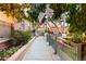 Walkway with landscaping, leading to a bridge at 1440 Little Raven St # 204, Denver, CO 80202