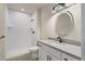 Basement bathroom with white subway tile and vanity at 1369 Burt Ave, Berthoud, CO 80513