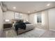 Finished basement bedroom with neutral decor and window at 1369 Burt Ave, Berthoud, CO 80513