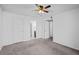 Spacious bedroom with carpet and ceiling fan for comfortable living at 7665 E Eastman Ave # D304, Denver, CO 80231