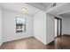 Bright bedroom with hardwood floors and large window allowing plenty of natural light at 7665 E Eastman Ave # D304, Denver, CO 80231