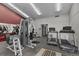 Community gym with modern exercise equipment for resident fitness at 7665 E Eastman Ave # D304, Denver, CO 80231