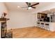 Large living room with wood floors, lots of light, and an open floorplan at 4878 E Kentucky Ave # A, Denver, CO 80246