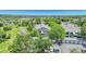 Elevated view of blue apartment complex with garages and nearby parking at 8065 W Eastman Pl # 6-102, Denver, CO 80227
